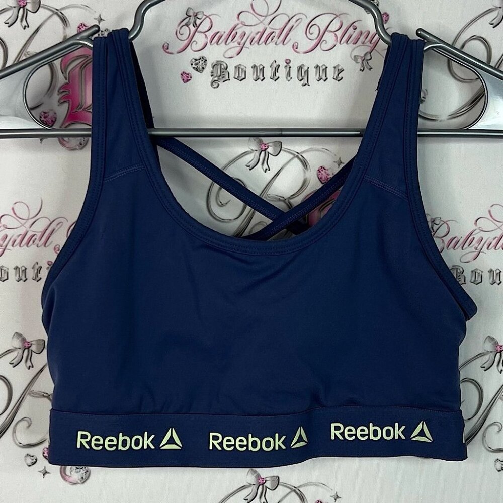 Reebok sports bra strappy cross pattern Women's Deep Blue Sports Bra green logo